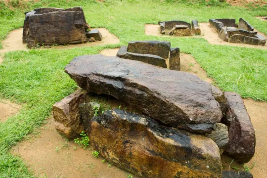 Ibbankatuwa Megalithic Tombs, ancient burial structures in Sri Lanka. Explore historical sites like these when staying at Nature Resorts in Sigiriya.